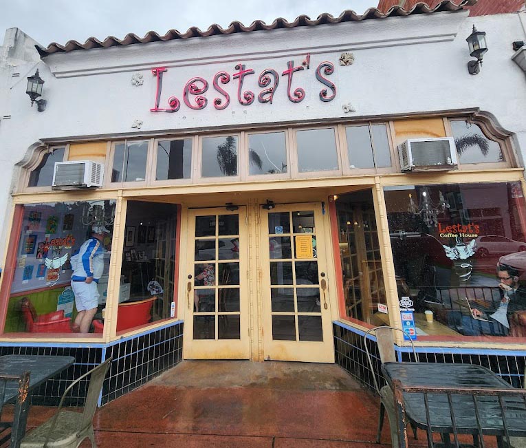 Interior of Lestat's Coffee House on Adams Avenue, featuring cozy seating and ambient lighting.