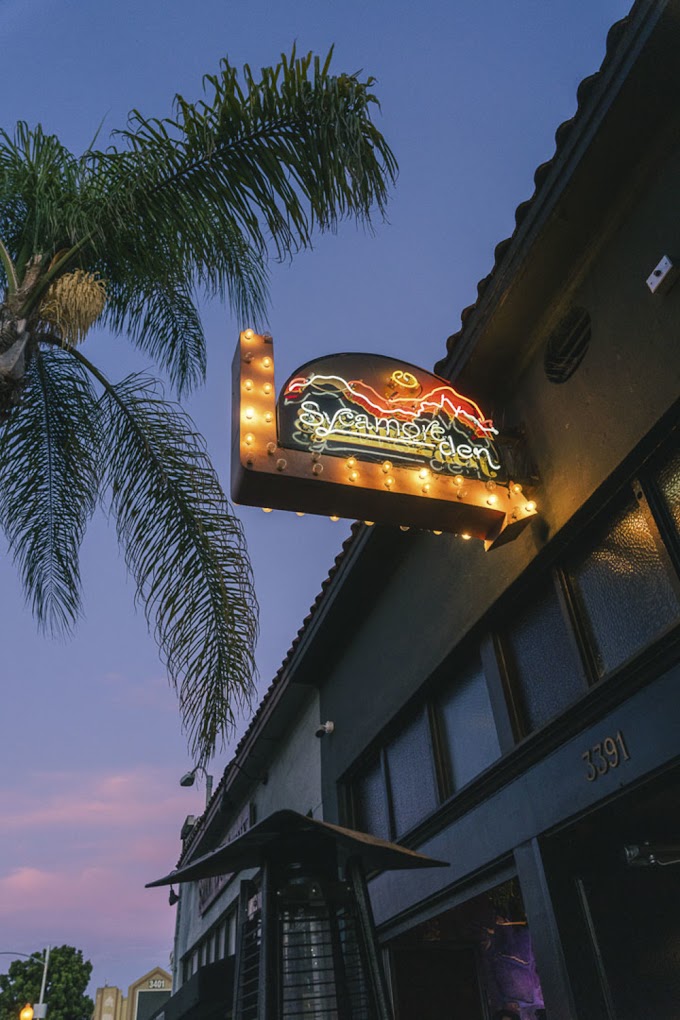 Sycamore Den in San Diego, a retro cocktail bar with a cozy ambiance.