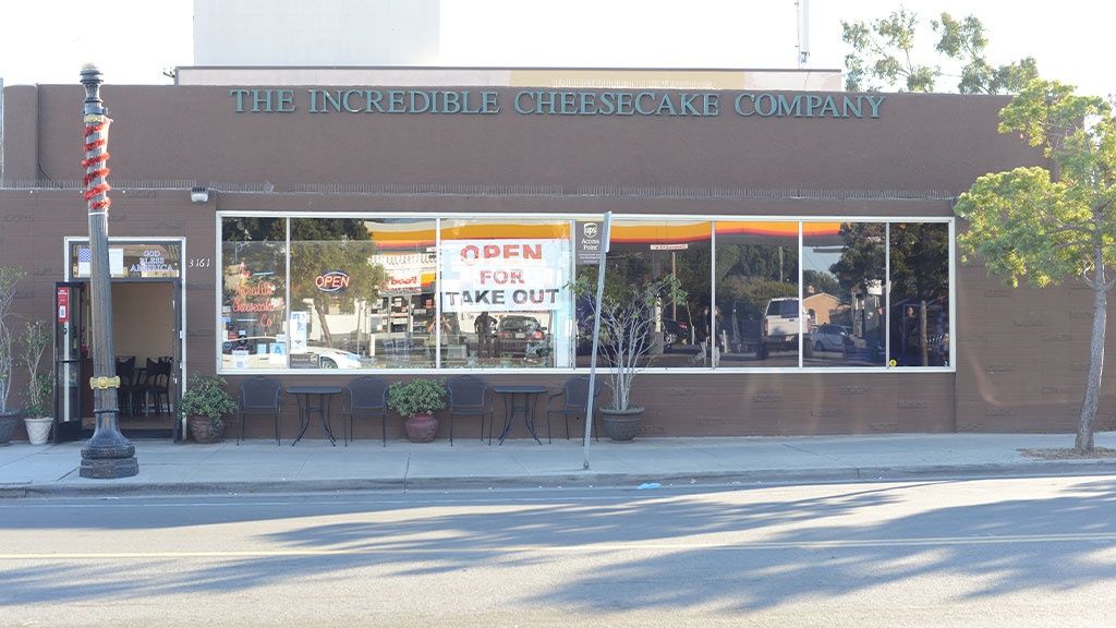 The Incredible Cheesecake Co storefront in San Diego, offering handcrafted cheesecakes.