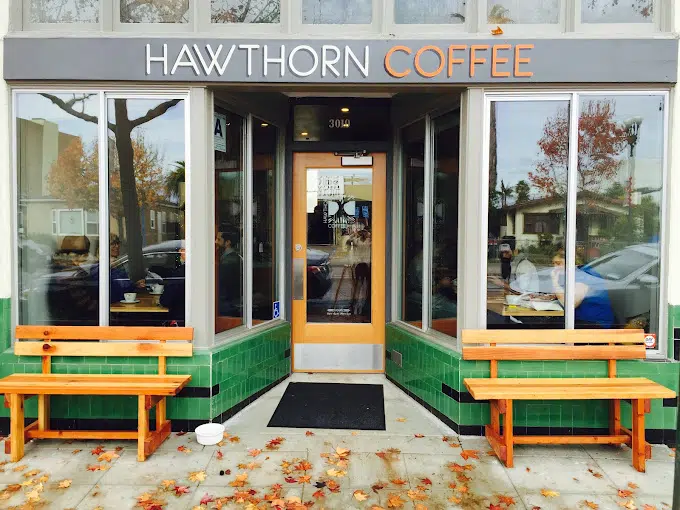 Barista pouring freshly brewed coffee at Hawthorn Coffee on Adams Ave, San Diego.