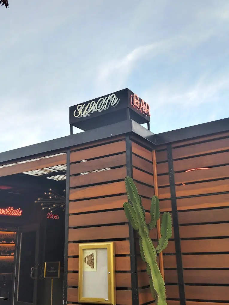 Swan Bar in San Diego, a cocktail lounge with craft drinks and upscale ambiance.