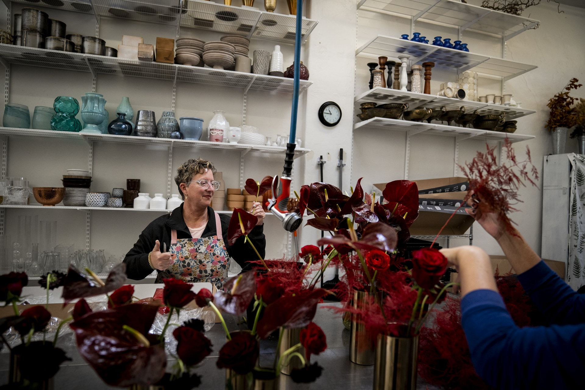 Derith Mason works in the shop at Artistic Florals