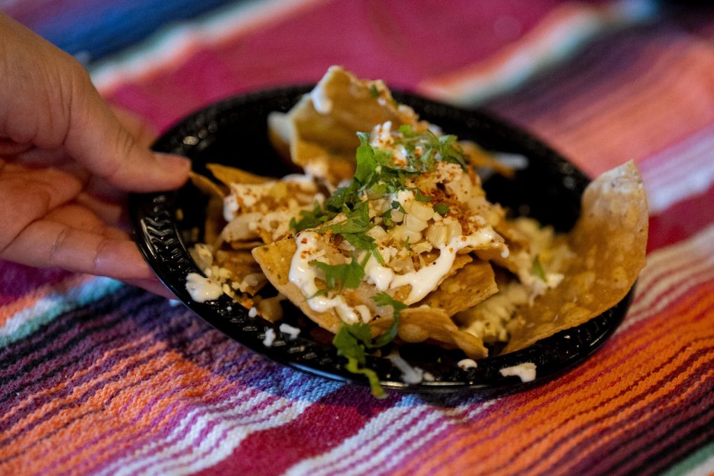 Ponce's Mexican Restaurant serves up elote nachos to participants in the 2025 Taste of Adams Avenue  on Sunday, June 29, 2025 in San Diego, California. (Sam Hodgson / Uptown 11 Studios)