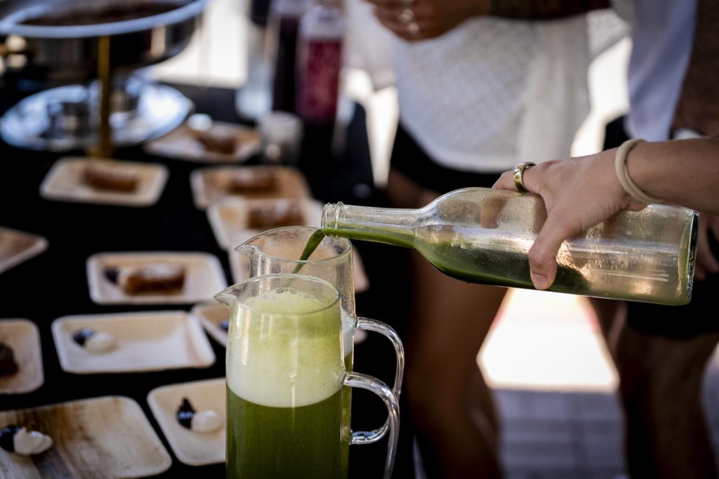 Madi serves mimosas to participants in the 2025 Taste of Adams Avenue  on Sunday, June 29, 2025 in San Diego, California. (Sam Hodgson / Uptown 11 Studios)