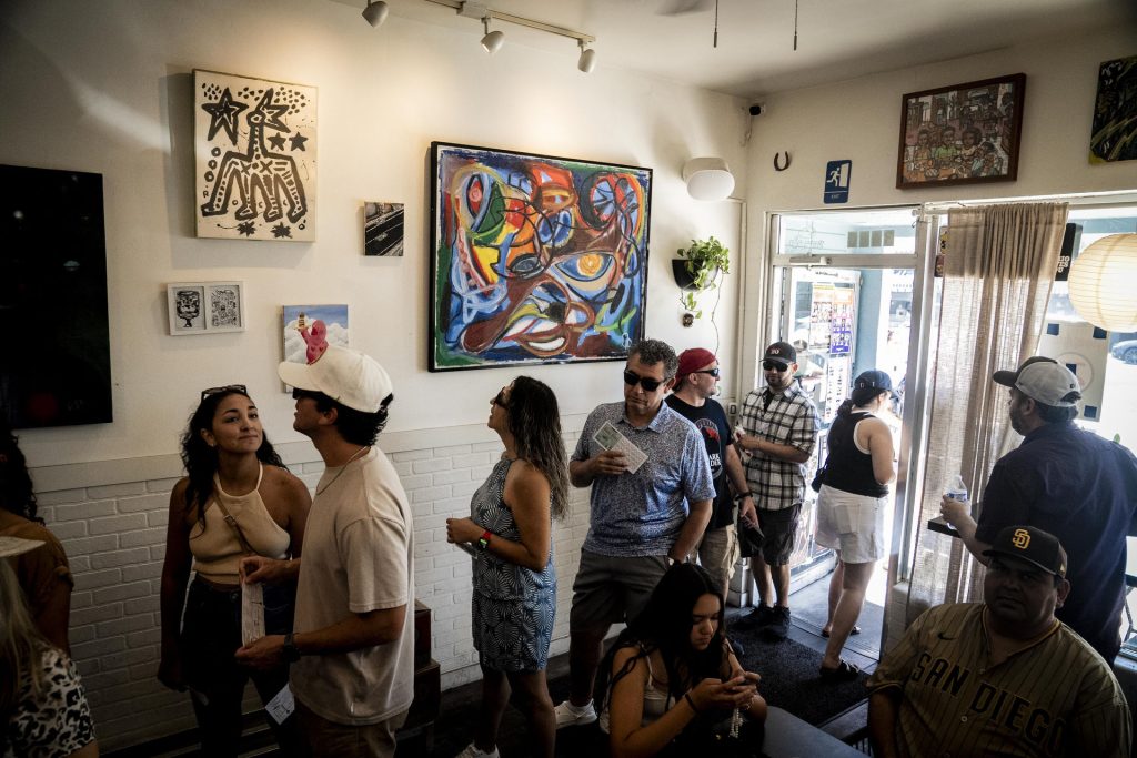 Hayes Burger serves up special tasting items to participants in the 2025 Taste of Adams Avenue  on Sunday, June 29, 2025 in San Diego, California. (Sam Hodgson / Uptown 11 Studios)