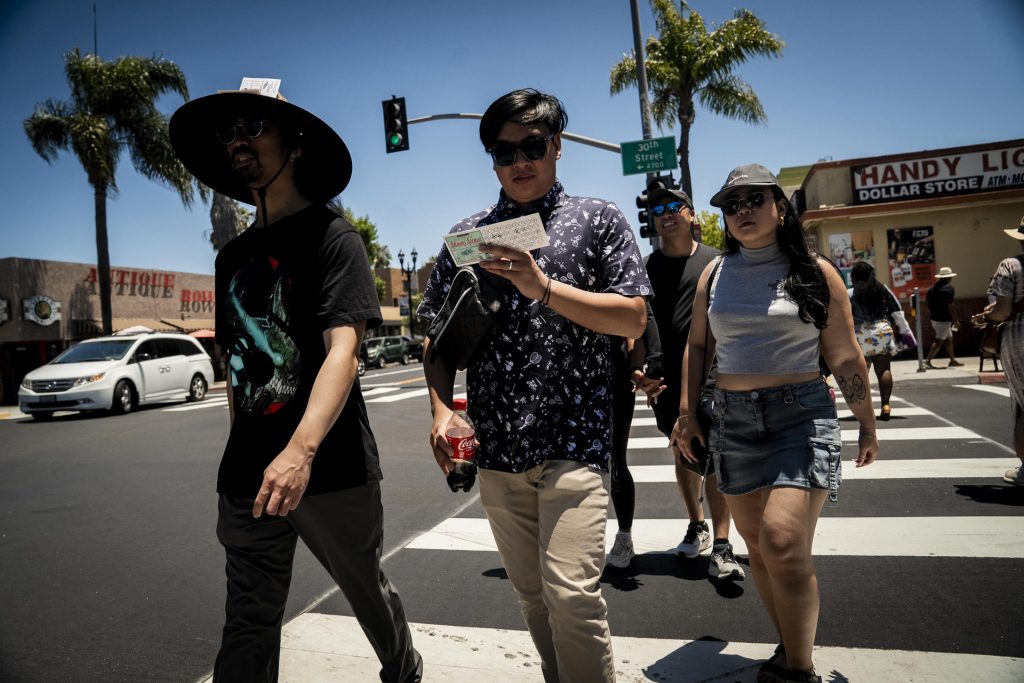Restaurants serve up special tasting items to participants in the 2025 Taste of Adams Avenue  on Sunday, June 29, 2025 in San Diego, California. (Sam Hodgson / Uptown 11 Studios)