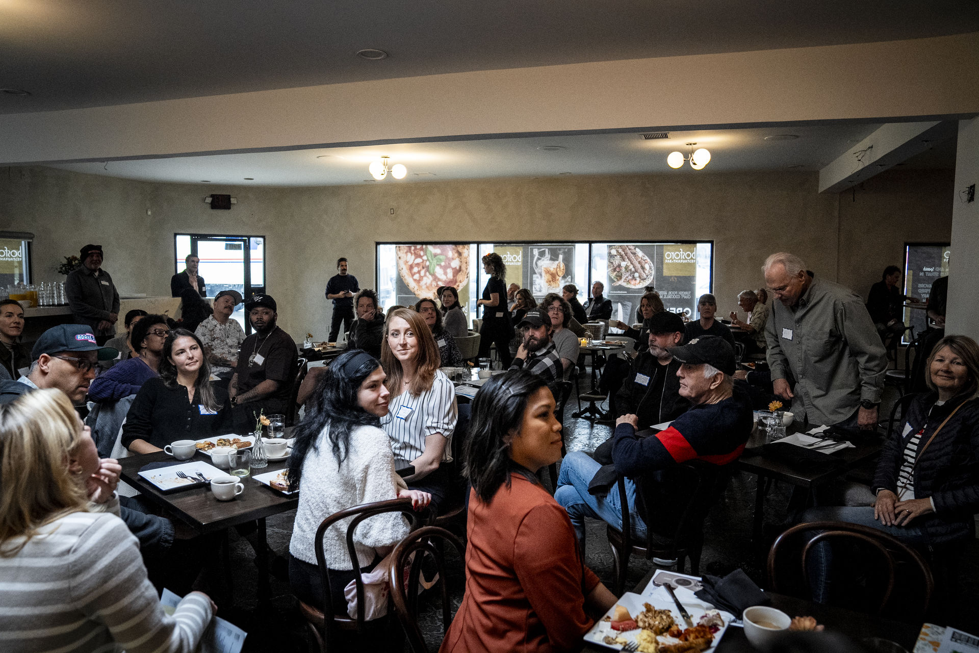Community members attend the Adams Avenue Business Association’s annual breafkast at bosforo